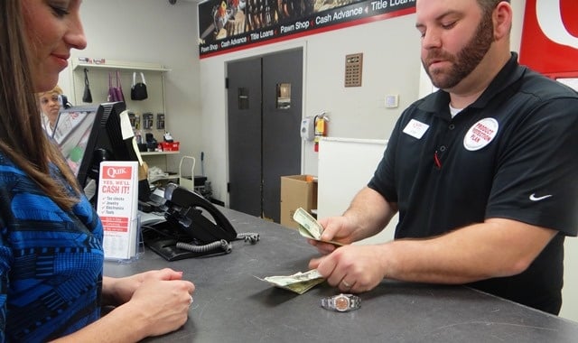 customer-pawning-a-watch customer-pawning-a-watch